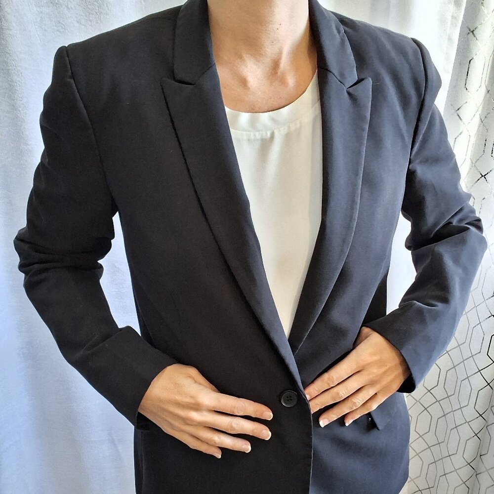 3. Attitude Jay Manuel Black Blazer in a size 6.